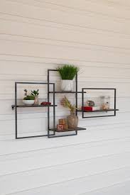 Perfect when hung along entryways, living rooms, bedrooms, or dining areas. Multi Level Wood And Metal Wall Shelf Metal Wall Shelves Wood And Metal Shelves Wall Shelf Decor