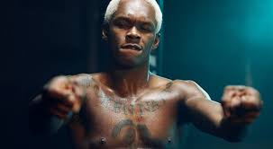 Israel adesanya has a bunch of different cartoon tattoos including the deadpool!! From Dancer To Fighter How Israel Adesanya Became The Fastest Rising Star In Mma Myprotein