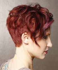 For the lady in the pic above colored her natural hair red filled with curls, and in a way of making her hair look fashionable she cut her hair on the sides. Short Wavy Casual Hairstyle Medium Red Hair Color With Dark Red Highlights Side View Short Red Hair Short Wavy Haircuts Short Wavy Hairstyles For Women