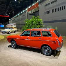 Image result for Herald Yellow 1976 Subaru