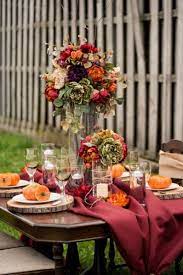 A Bold Wedding Tablescape With A Burgundy Table Runner Bold Floral Centerpieces Ca Fall Wedding Table Decor Fall Wedding Tablescapes Wedding Inspiration Fall