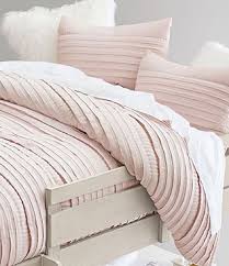 Snowball dots on a brown background make this pillowcase really stand out. Dorm Shop Event Pottery Barn