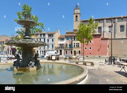 Church Sainte Madeleine and fountain at Martigues in France, a commune  northwest of Marseille Stock Photo - Alamy