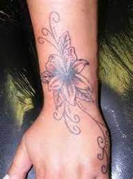 The Anthurium A Great Choice Among Hawaiian Flower Tattoo Flower Wrist Tattoos Wrist Tattoos For Guys Hand Tattoos For Girls
