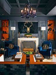 It adorns sofas, desks, entertainment centers, tables and accessories. 28 Gorgeous Living Rooms With Black Walls That Create Cozy Drama