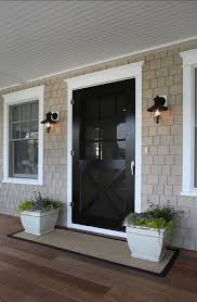 Pretty Front Entry I Like The Long Welcome Mat That Has The Planters Sitting On It As Well House Exterior Front Door Front Porch Decorating