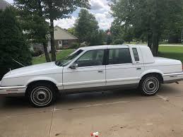 Image result for Medium Driftwood 1993 Chrysler
