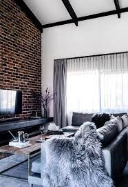 Please note the three car garage looks exactly like the 2 car garage except the front wall is pulled forward approximately 12' and a single door to the new bay is added. How To Create A Modern Farmhouse Feature Wall Living Room Brick Living Room Brick Feature Wall