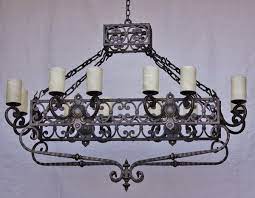Maybe you would like to learn more about one of these? 1108 12 Spanish Revival Wrought Iron Chandelier Spanish Revival Lighting