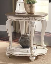 Ashley furniture ingel 3 piece coffee table set brown. Realyn End Table Ashley Furniture Homestore Wood End Tables Signature Design By Ashley End Tables