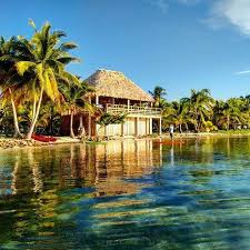 My Kind Of Afternoon Paddleboarding The Turquoise Caribbean On Southwater Caye Belize Beach Pelic Caribbean Islands Vacation Belize Vacations Vacation