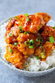 A Bowl Of Rice Topped With Spicy Firecracker Chicken Spicy Chicken Recipes Firecracker Chicken Chicken Dinner