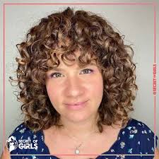 A rich red curly weave stops at the shoulders to frame an oval face with its full shape. 60 Best Curly Hairstyles With Bangs To Try Secret Of Girls