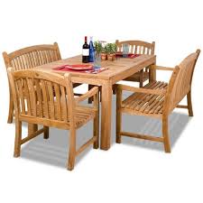 This steel patio dining set is straightforward to assemble and even features an umbrella hole to help keep your surface shaded. Geneve 5pc Teak Wood Patio Dining Set International Home Miami Target