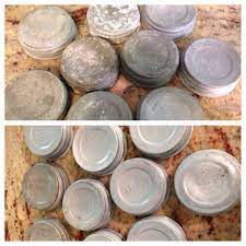 Some of the zinc lids have ball embossed on them, but others are just plain. Before After Cleaning Old Vintage Zinc Metal Canning Mason Atlas Jar Lids Remove The Old Zinc Lids Lay Mason Jar Decorations Ball Mason Jars Jar Lid Crafts