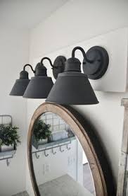 They can add a rustic charm and farm style to any bathroom in your home. Light Fixtures Bathroom Vanity Farmhouse Bathroom Vanity Simple Farmhouse Bathroom
