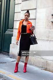Model Aya Jones Wears An Orange Denim Jacket Black Dress Red Boots News Photo Getty Images