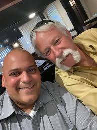 Ex Chief Fred Thibault and current Chief Marcos Padilla celebrating the  life of His departed mother.