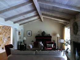 It can be installed along the sloped surface and you can adjust each light in a different direction to create accents. Which Lighting Fixture For My Living Room With Vault Ceiling