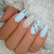 Acrylic nails can be short, medium or long, press on or glue on, be curved or square and there are styles for adults and children. Ice Blue And Diamond Jet Set Beauty Nails Delizianails Christmasnails Iceblue Bluenails Icen Blue Glitter Nails Blue Acrylic Nails Blue Gel Nails
