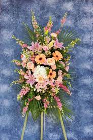 Rest easy knowing that at rose, you'll be treated just like family. Peaceful Peach Standing Spray In Simi Valley Ca Michael S Flowers