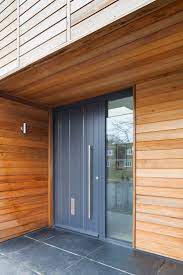 Cladded House Urban Front Contemporary Front Doors Uk Contemporary Front Doors House Cladding Modern Bungalow Exterior