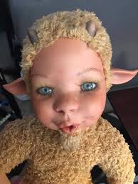 I found this guy at Goodwill today and I couldn't walk away from him. I  collect porcelain dolls but have never seen one like this. And we couldn't  find much info on