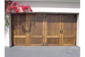 Choose from several different garage door panel styles and colors. Our French Inspired Home Garage Doors Garage Doors Wooden Garage Doors Garage Door Styles