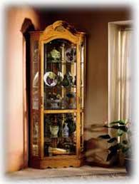 Does your home have large, open spaces (lucky you!) and you are at a loss on how to fill areas with interest and stylized ideas? Corner Curio Cabinets Made In Usa The Clock Depot