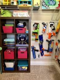 Get those builky plastic guns off the floor with the easy diy nerf gun storage idea! Make Your Own Easy Diy Nerf Gun Wall
