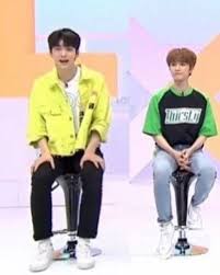 Txt's soobin (left) & taehyun (right) for parents' day, the members made snow globe carnations for their parents. Image May Contain 2 People People Standing