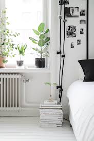 Simple Photo Gallery Wall Use B W For A Monochromatic Look Or Mute Vibrant Colors To Change The Look Ar Wall Lights Bedroom Home Decor Bedroom Reading Lights