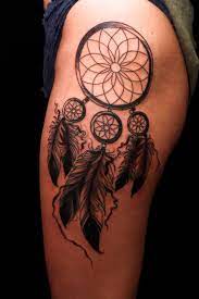The top dream catcher has a beautiful heart design in the center. Dream Catcher Tattoo On Left Leg Sleeve