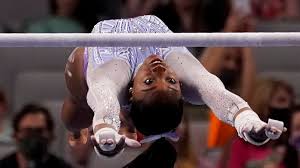 On sunday, she combined crisp releases in a beautiful, flowing routine that gave her the highest bars score. Simone Biles Leads Us Gymnastics Championships After Night 1 Wusa9 Com