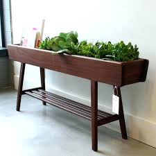 The table is sealed with polyurethane for easy cleaning and to protect from stains. Herb Garden Stand Indoor Outdoor Plant Stands Plant Stand Indoor Herb Garden Pla Plant Stand Indoor Outdoor Herb Garden Indoor Plants