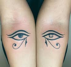 Black and grey eye with pyramid tattoo on hand. Eye Of Horus Tattoos Meanings Tattoo Designs Ideas