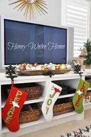 10 Ways To Hang Your Stockings Without A Mantel Christmas Apartment Christmas Decorations Apartment Natural Christmas Decor