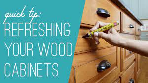 These come in a variety of wood tones and are used just like a felt marker. Refreshing A Worn Wood Cabinet With A Stain Marker Youtube
