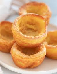 Perfect Vegan Yorkshire Puddings Tall Crispy Golden Sides Soft And Slightly Gooey Botto Vegan Yorkshire Pudding Yorkshire Pudding Recipes Aquafaba Recipes