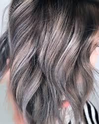 Up to now it has been kept as one of mother nature's top secrets but you can silver and grey highlights. Dark Grey Silver Balayage Metallic Hair Hair Highlights Blue Brown Hair
