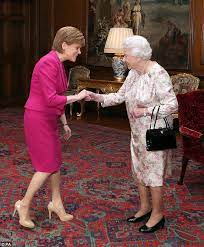 Scotland's first minister nicola sturgeon and her husband peter murrell present queen elizabeth ii and the duke of edinburgh with a stone bench, as they attend a garden party at the palace of holyroodhouse in edinburgh Britain S Most Powerful Woman Nicola Sturgeon Meets The Queen Daily Mail Online