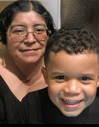 Would it be possible to have the lady in this picture smile, it was taken  before she could smile and the gentleman has now passed away. It the only  photo she has.