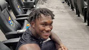 JB Brown reacts to KU's defensive performance in win over Illinois