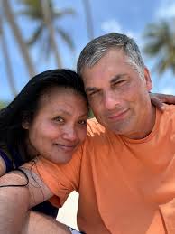 What is the purpose of a stake and wire found in a garden bed?