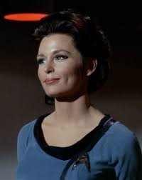 The unknown ensign's fame is due to her iconic red shirt