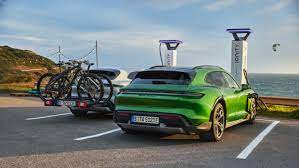 The front luggage compartment is complemented by an enlarged rear boot, which can be extended from 446 litres¹ to a total of 1.212 litres¹ when the rear seat backrests. World Premiere Of The Cross Turismo The All Rounder Among Electric Sports Cars