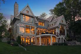 Craftsman style house plans are defined by details such as square tapered columns, stacked stone accents and exposed rafter tails. What Color Siding Goes With Stone Stone And Siding Colors Gambrick