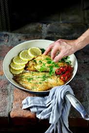 Sole meunière (or sole à la meunière) is a classic french fish dish consisting of sole, preferably whole (gray skin removed) or filet, that is dredged in flour, pan fried in butter and served with the resulting brown butter sauce, parsley and lemon. Sole Meuniere A La Julia Child Taste With The Eyes