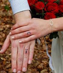 They require just as much commitment as the vows themselves, they are impossible to lose, and are less expensive than the traditional option. 60 Awesome Wedding Ring Tattoos Weddingomania