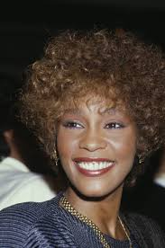 17 Of Whitney Houston's Most Iconic Beauty Moments